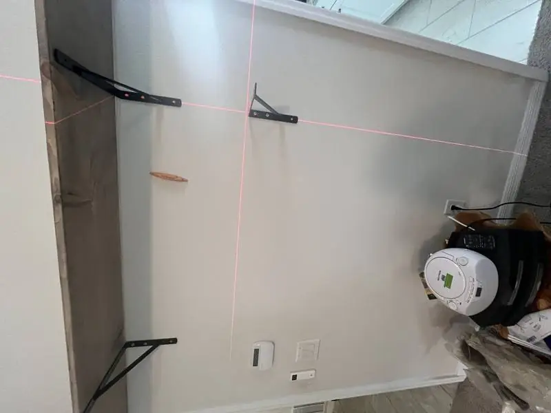 Precision Shelf Layout - Carpentry project by Tampa Handyman